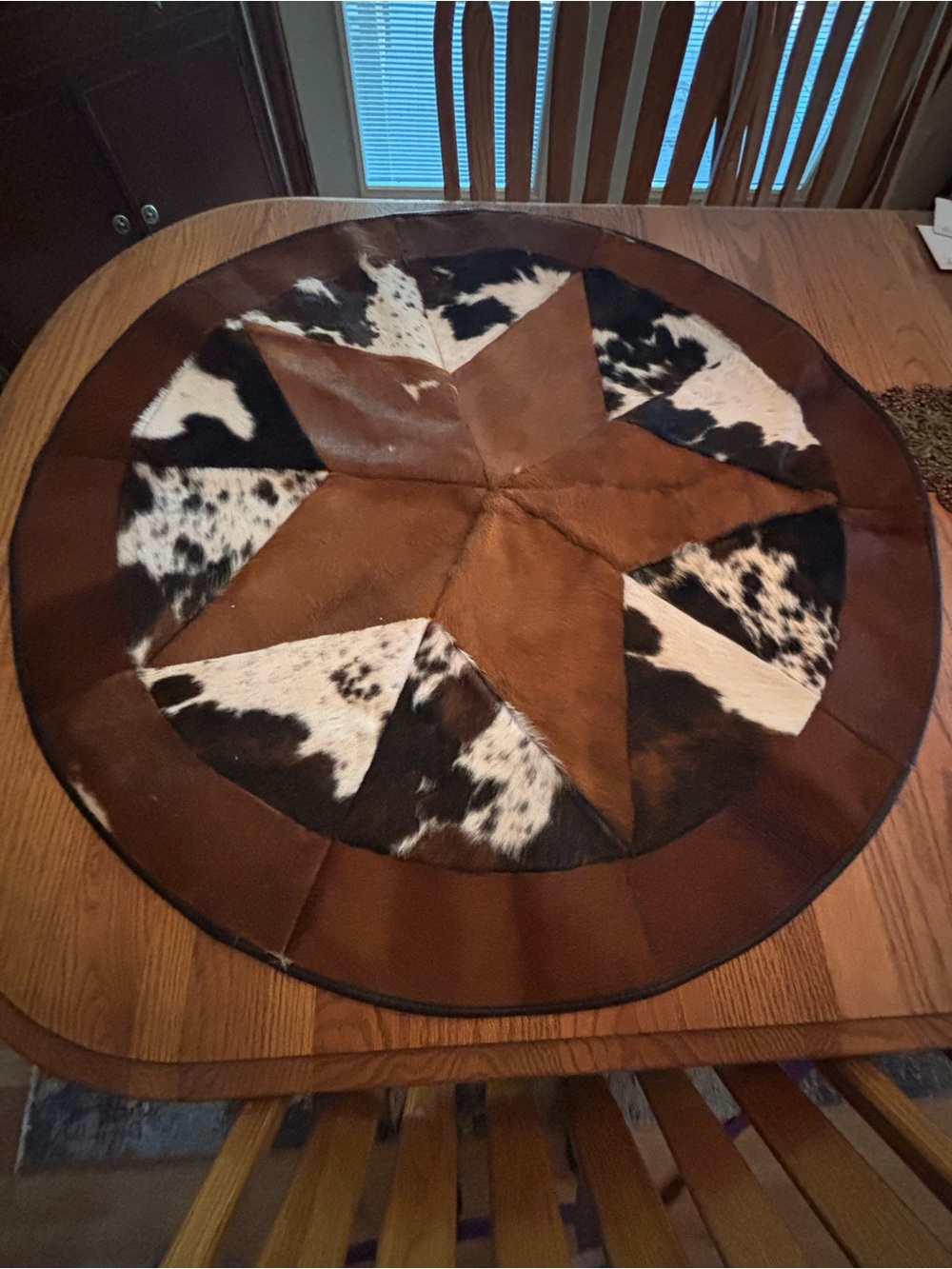 Rustic Brown and Black Cowhide Star Accent Rug - Home Accents